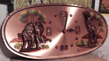 Wall clock mounted within hand painted Copper plate