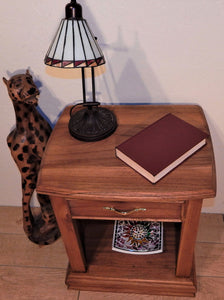 Cheetah wood sculpture at Roots Cabinets & Tile 
