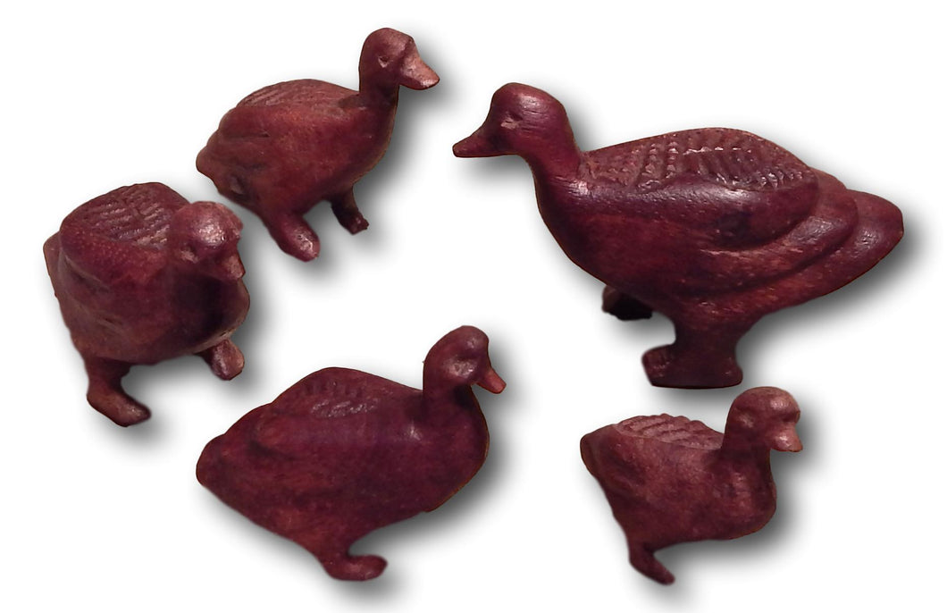 Geese family hand carved from Mukwa wood