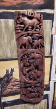 Wall art hand carved from Mukwa wood