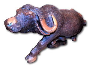 Wildebeest hand carved from Mukwa wood