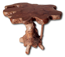 Table hand made from solid Teak wood slab
