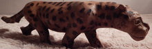 Leopard hand carved from Seringa wood