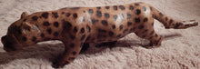 Leopard hand carved from Seringa wood