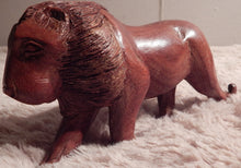 Lion handcrafted from Mukwa wood